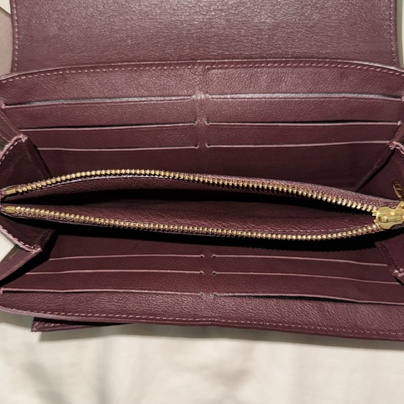 Louis Vuitton Brown Monogram Clutch with Gold Accent - Picture 9 of 11